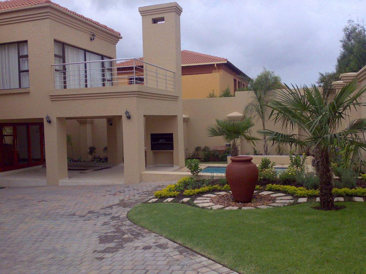 Dainfern House, a luxurious double storey residence with pool and tropical garden landscaping
